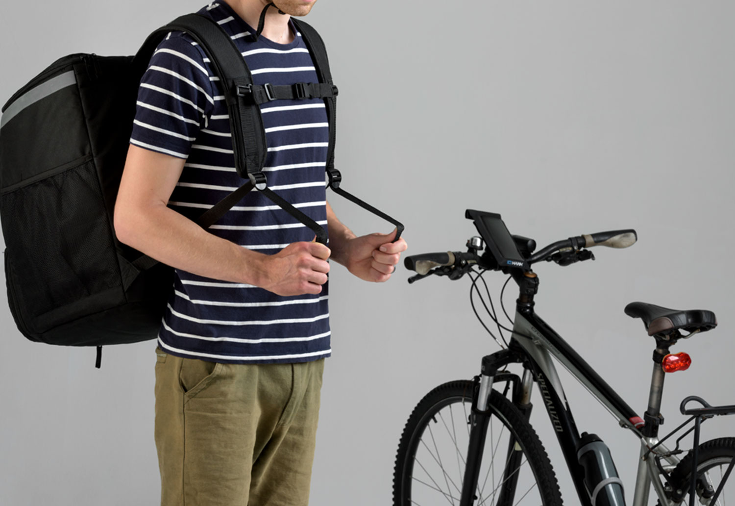 A delivery partner is about to get on a bike