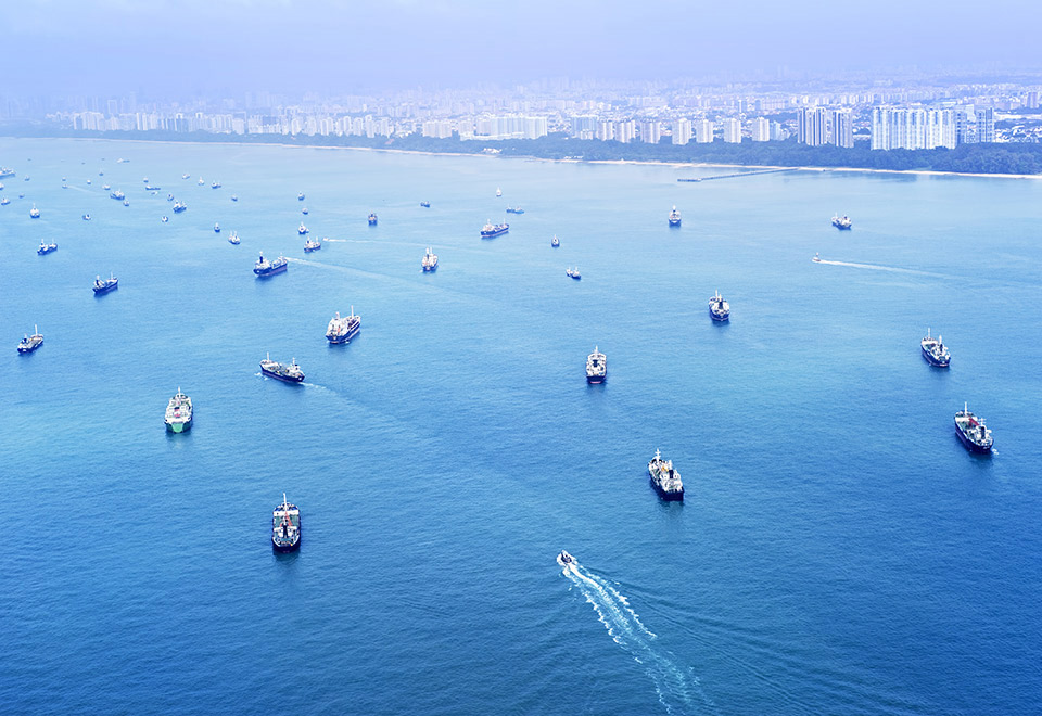 Cargo ships sitting on the sea