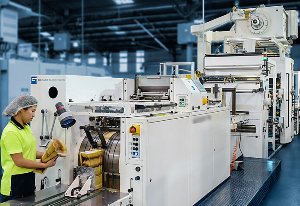 Image of woman manufacturing a paper bag