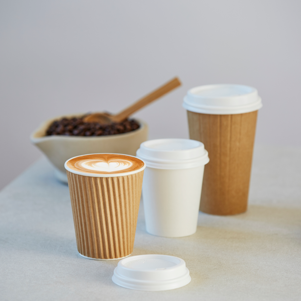 Image of takeaway cup on a beach