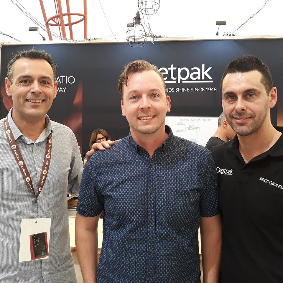 Image of Adelaide's Glenn Bailey winning the Precision Series Smackdown final. He s standing with Adam Genovese from Genovee coffee and Clint Hendry