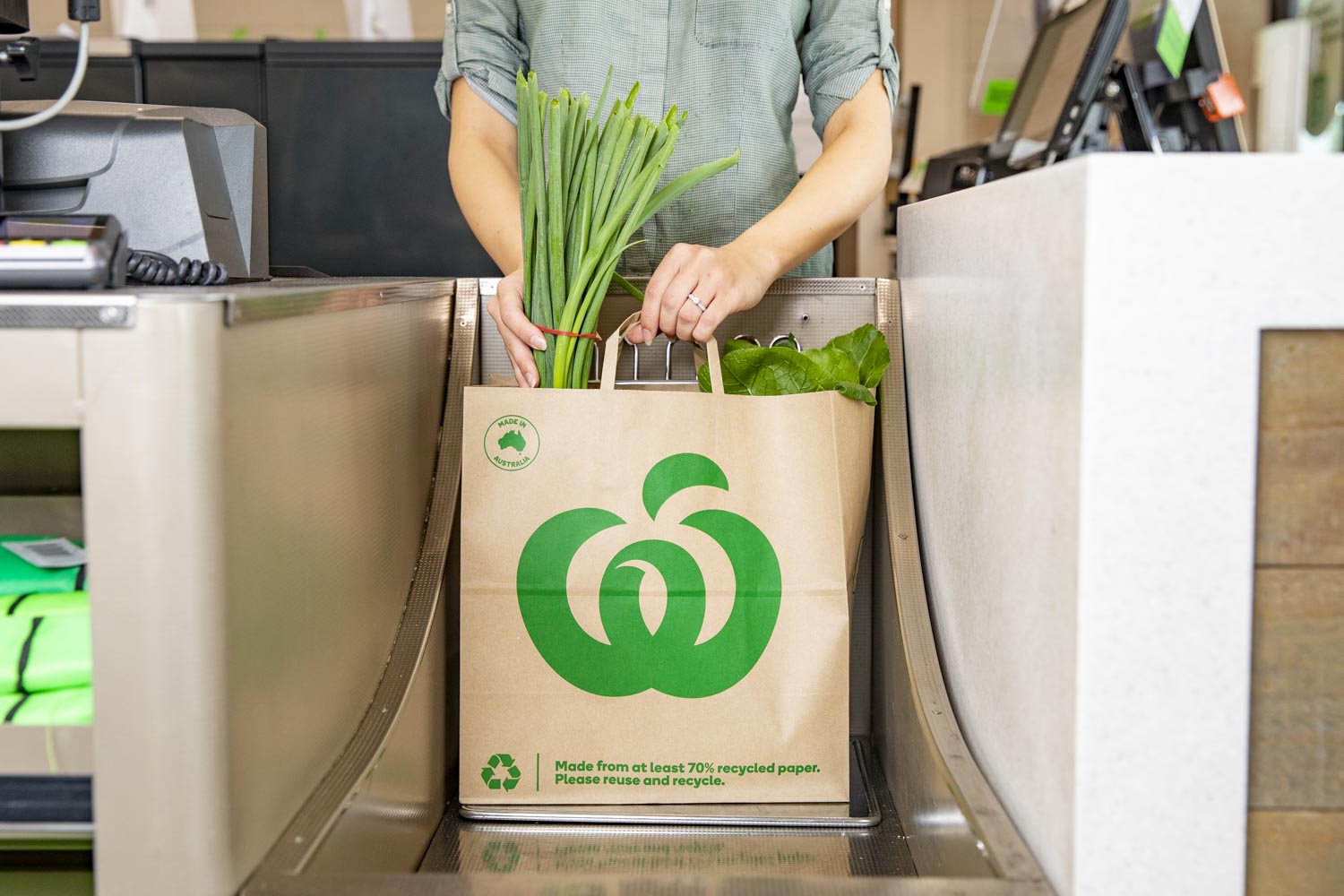 Woolworths locally made Detpak paper carry bag pictured at the check out.